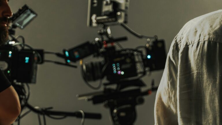 Illustrative photo of a professional film production set and camera crew